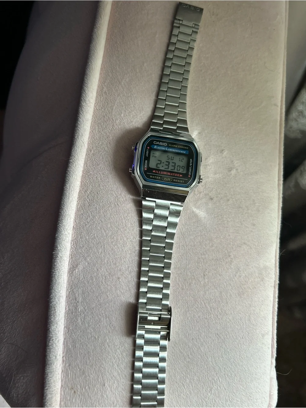 Casio Silver Digital Watch with Black and Blue Accents